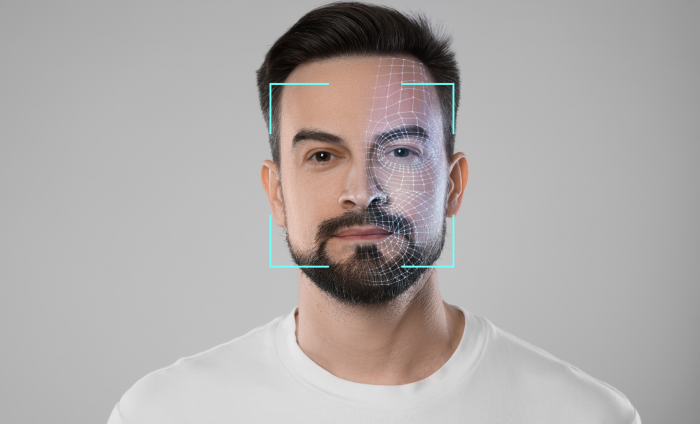 A man with his face being scanned